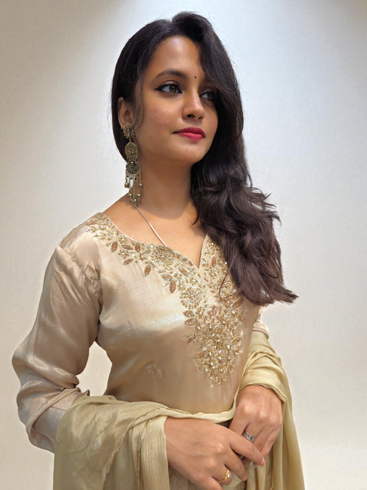 Designer beige short kurta with pleated palazzo and chinnon dupatta