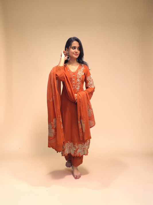 Women's cotton ethnic suit in rust orange with printed design