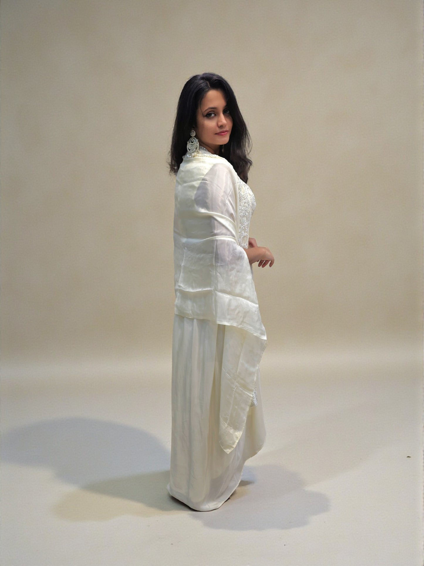 Designer ivory crop top and dhoti skirt outfit for weddings
