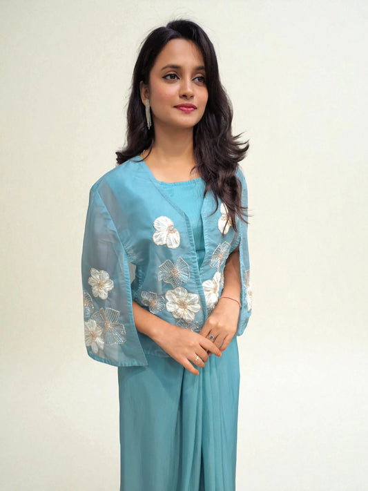 Designer blue Indo-Western set with crop top, dhoti skirt, and embroidered organza cape – Ambika Boutique