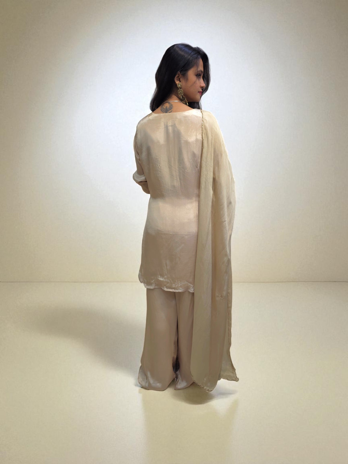 Luxury beige pure crepe silk zardozi outfit for weddings and parties