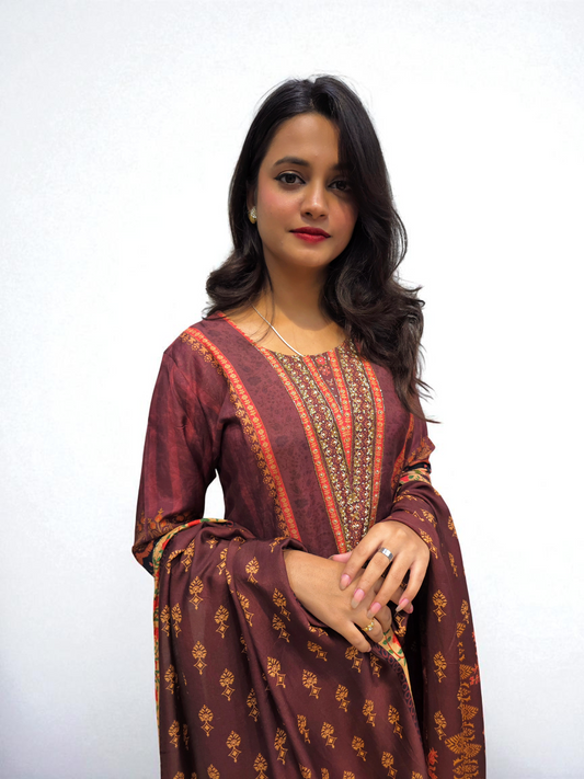 Woman wearing maroon and red printed kurti set with dupatta – traditional ethnic wear for festive occasions from Ambika Boutique