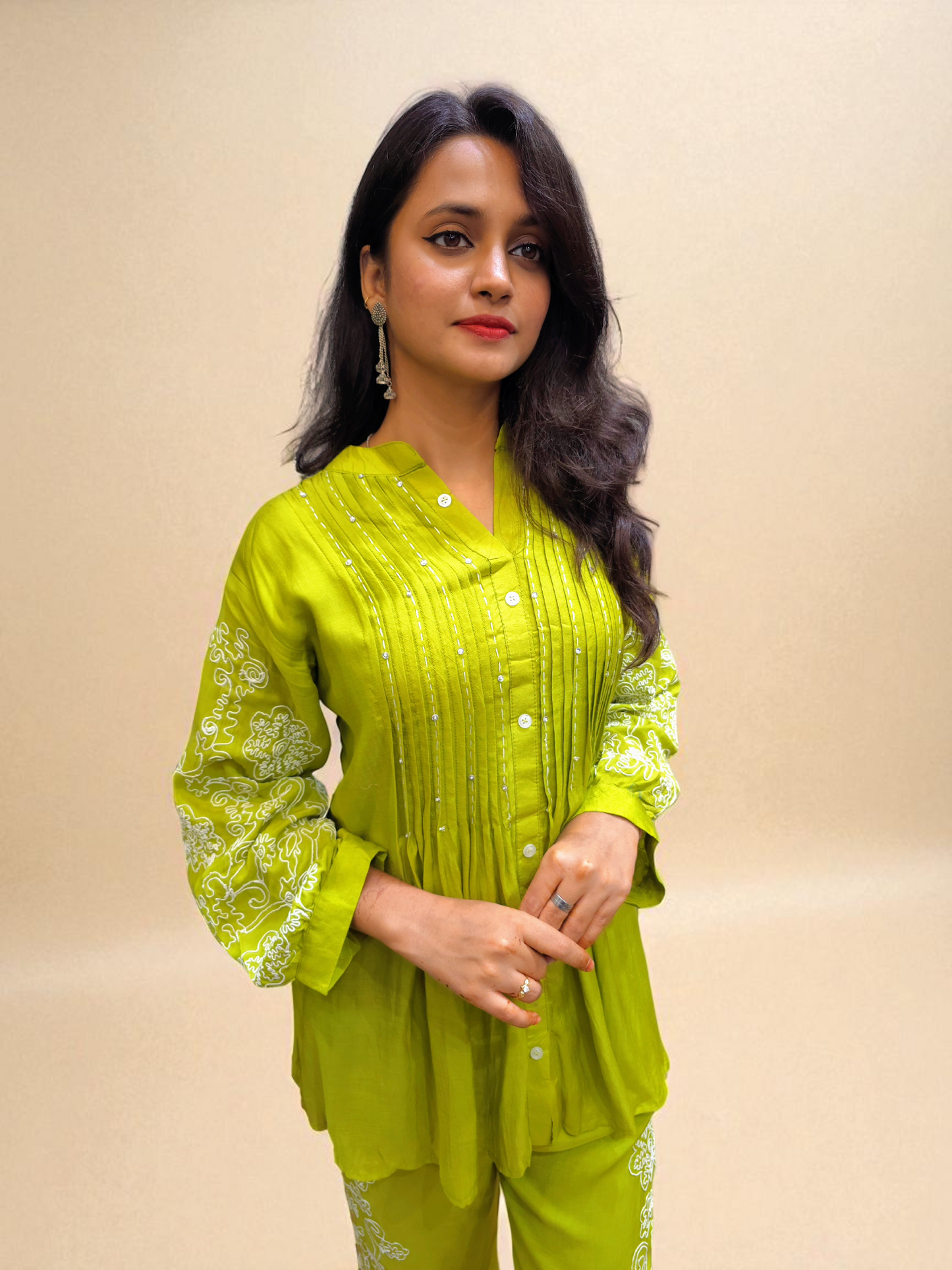 Pure muslin co-ord set for women with hand embroidery on kurta and pants, stylish ethnic wear for festive and office look.