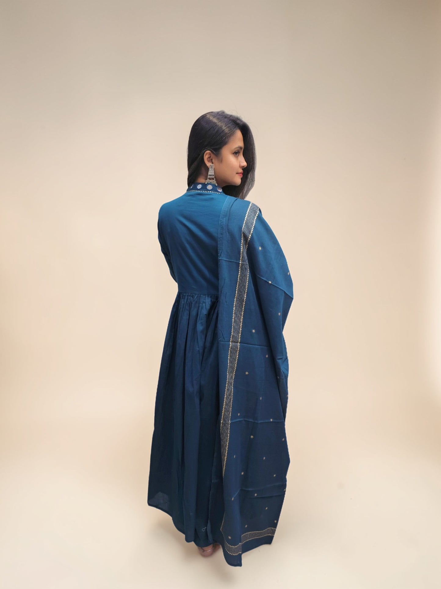 back view of Traditional blue Anarkali kurta set with embroidery and dupatta