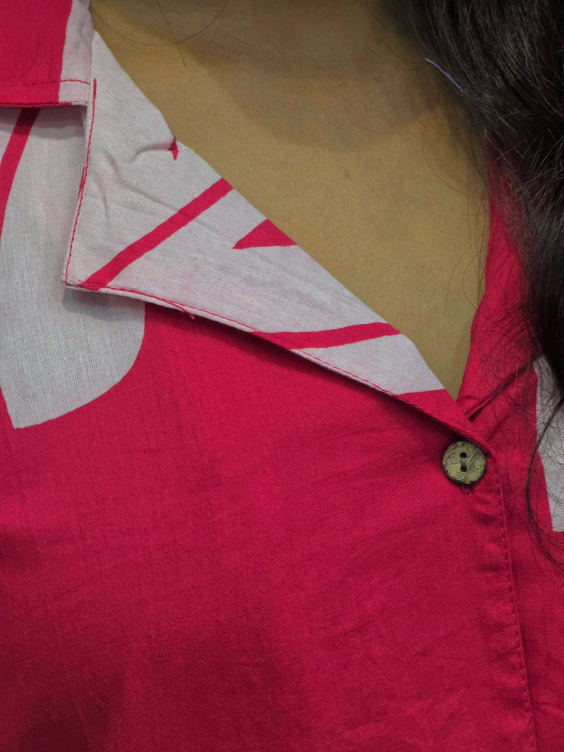 Close-up of a pink cotton co-ord set collar with printed details for women's summer office wear from Ambika Boutique.