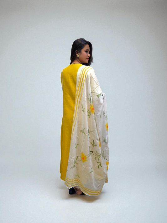 back view of Soft mul-mul cotton kurti set in yellow with floral embroidery – summer ethnic outfit for women by Ambika Boutique