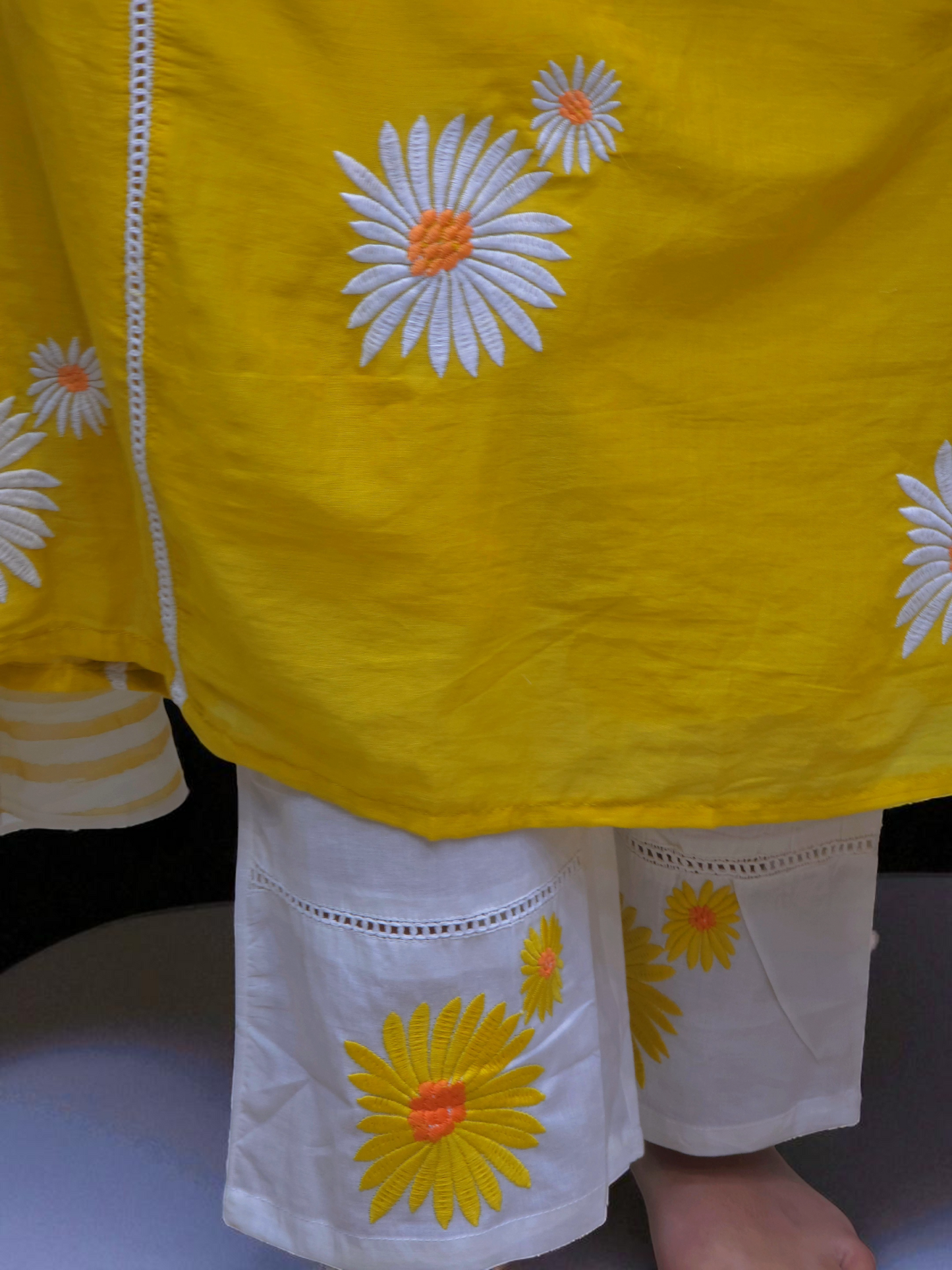 close up view of Mul-mul cotton kurta set for women with embroidered details and floral printed dupatta