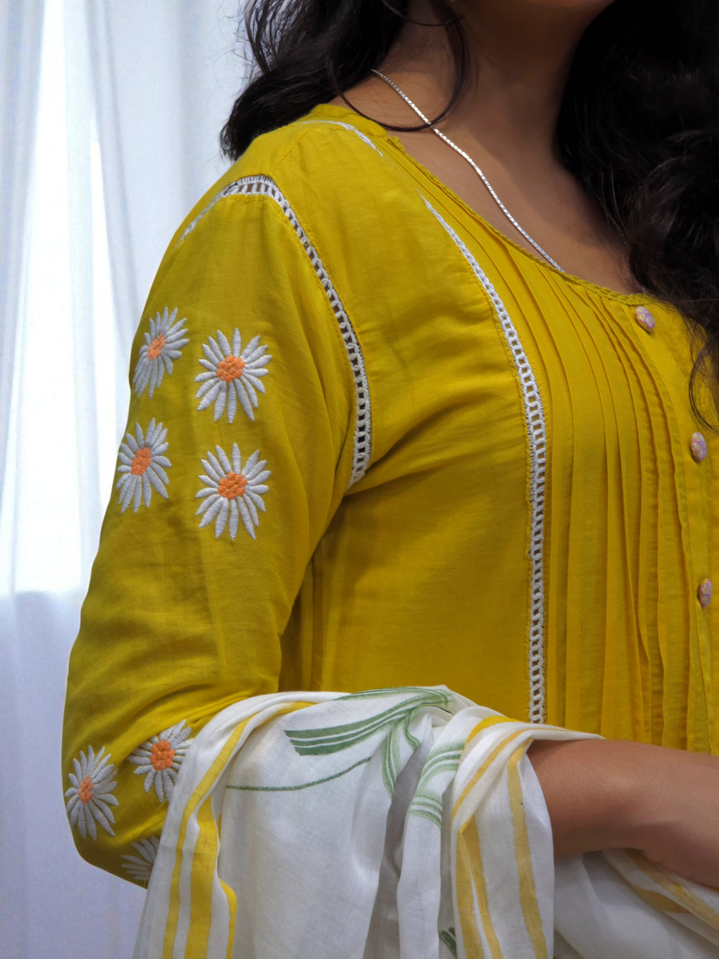 close up view of mul-mul cotton kurta set for women with embroidered details and floral printed dupatta – perfect for daily ethnic wear