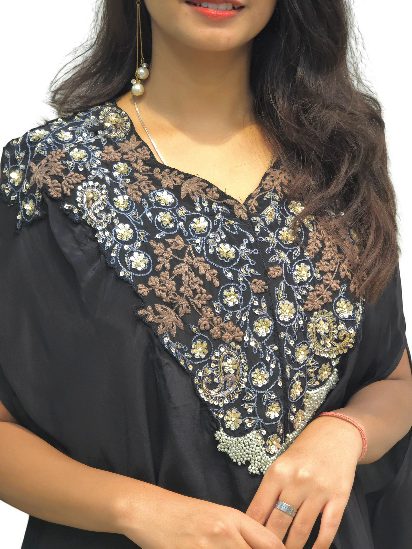 Woman wearing a Designer Black Cape with intricate hand embroidery, showcasing elegance and style for festive occasions.