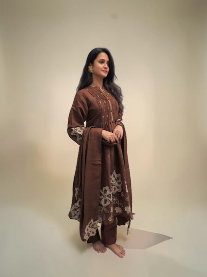 Brown Mul Chanderi suit set with floral embroidery and cutwork dupatta