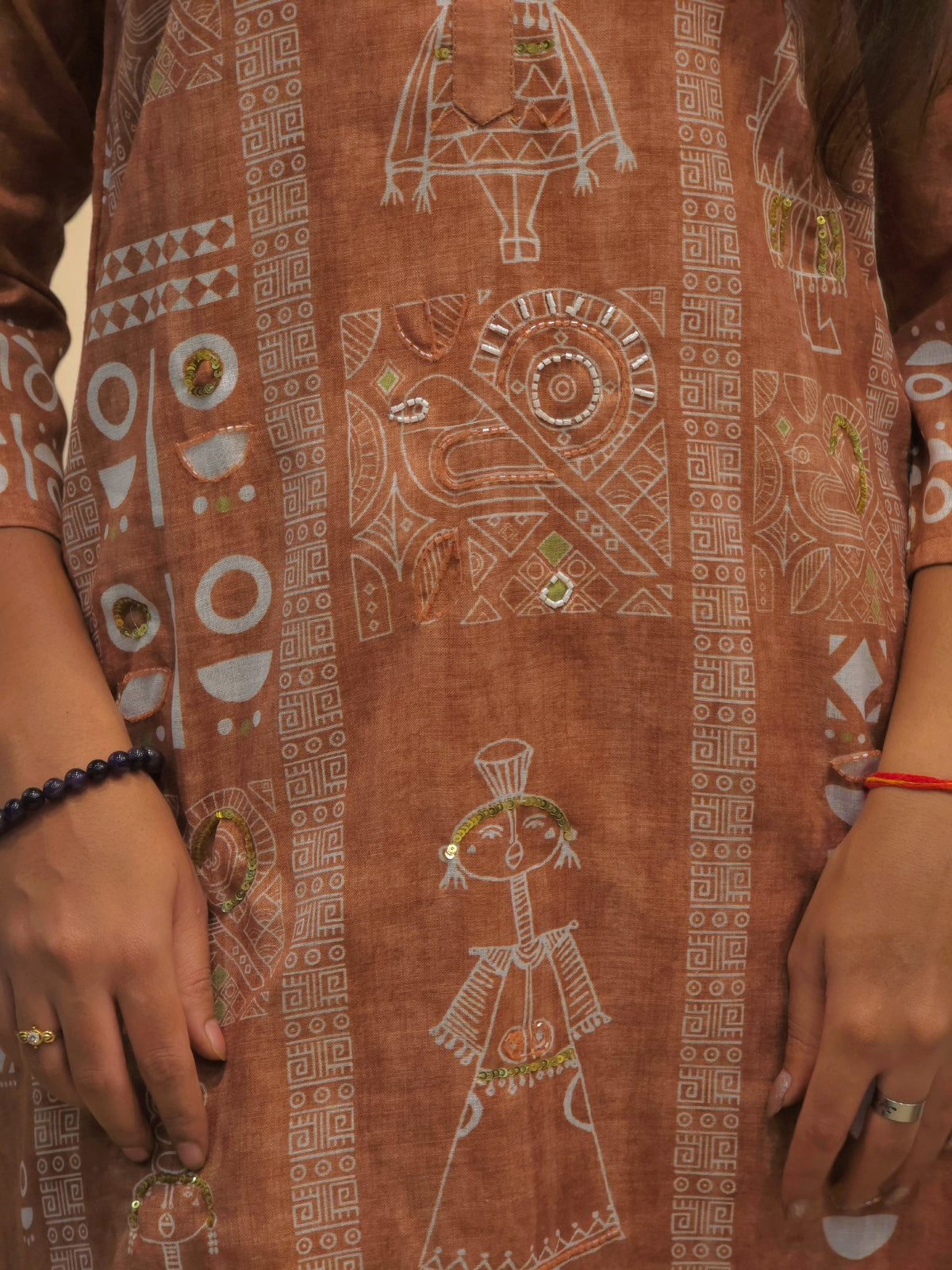 close up of Premium rust brown printed handwork cotton outfit for women
