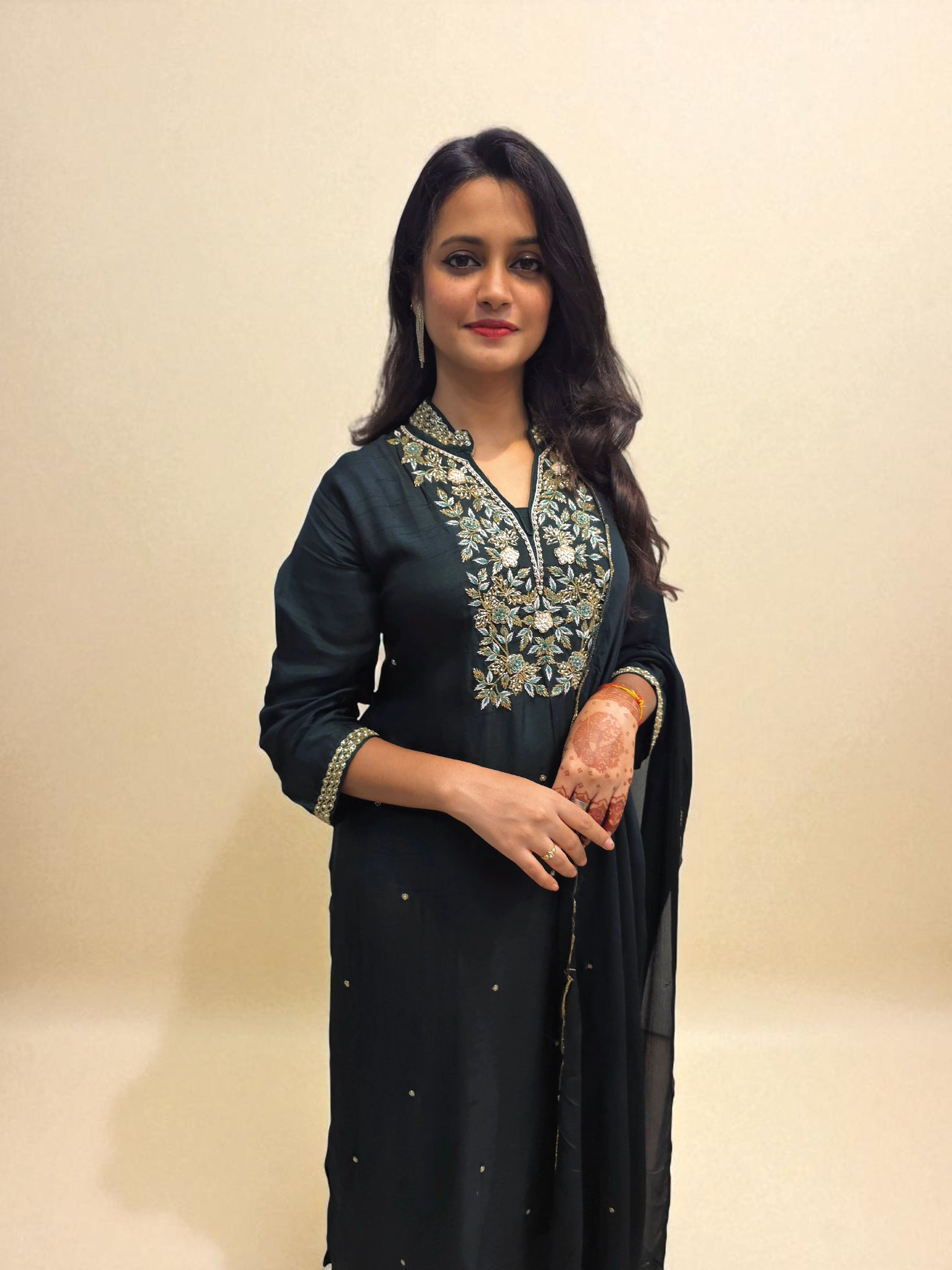 Dark green embroidered kurta set with matching dupatta for women