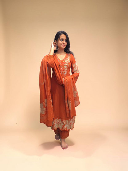 Women's cotton ethnic suit in rust orange with printed design