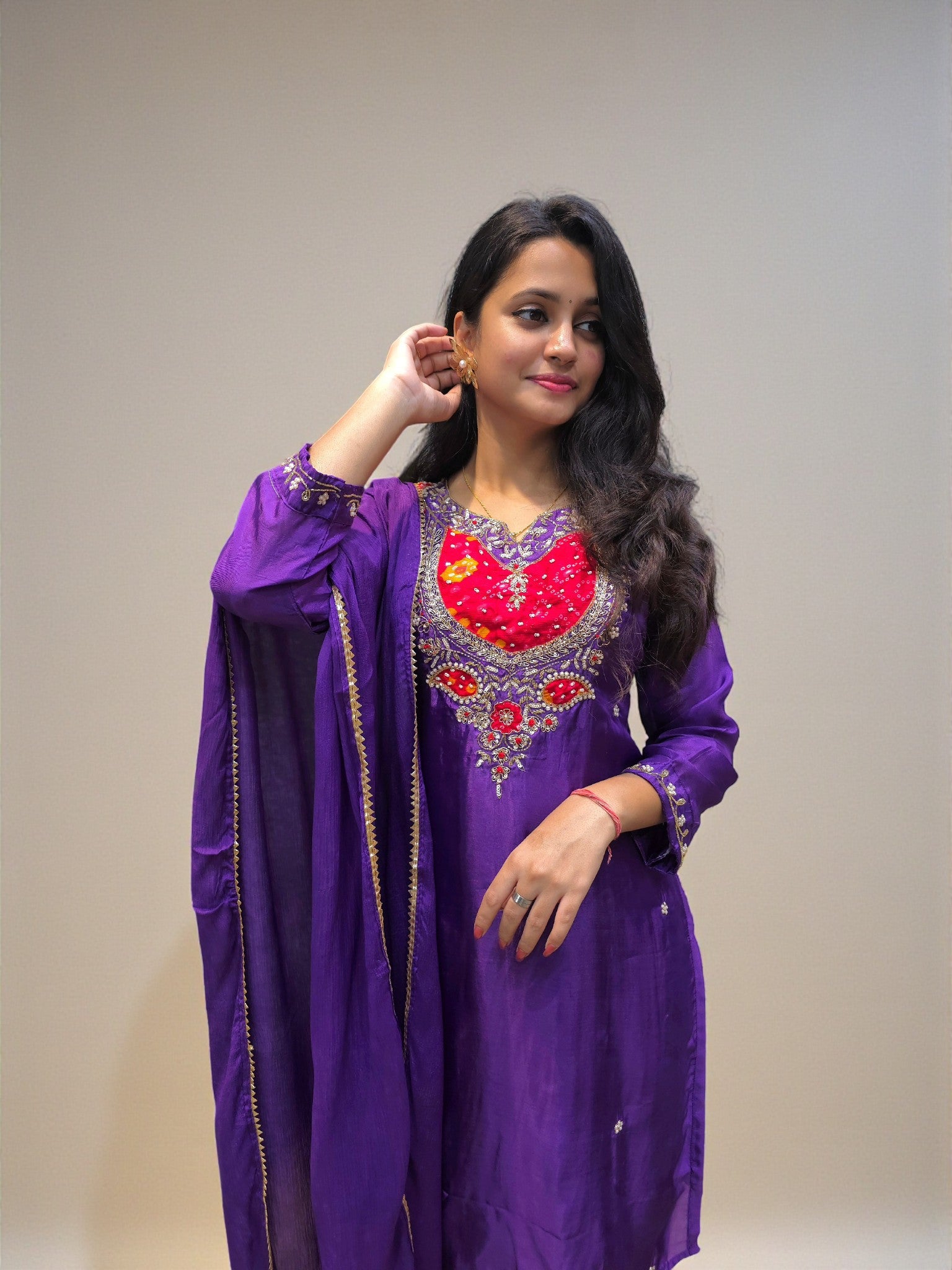 Women’s purple kurta palazzo set with intricate hand embroidery