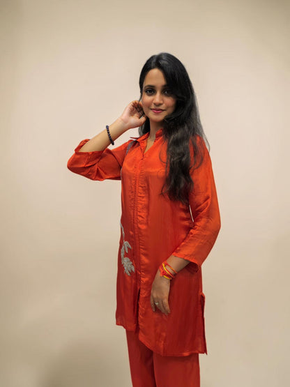 Designer rust orange kurta pant set with floral embroidery