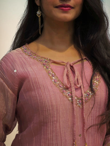Elegant dusty pink co ord outfit with sheer sleeves