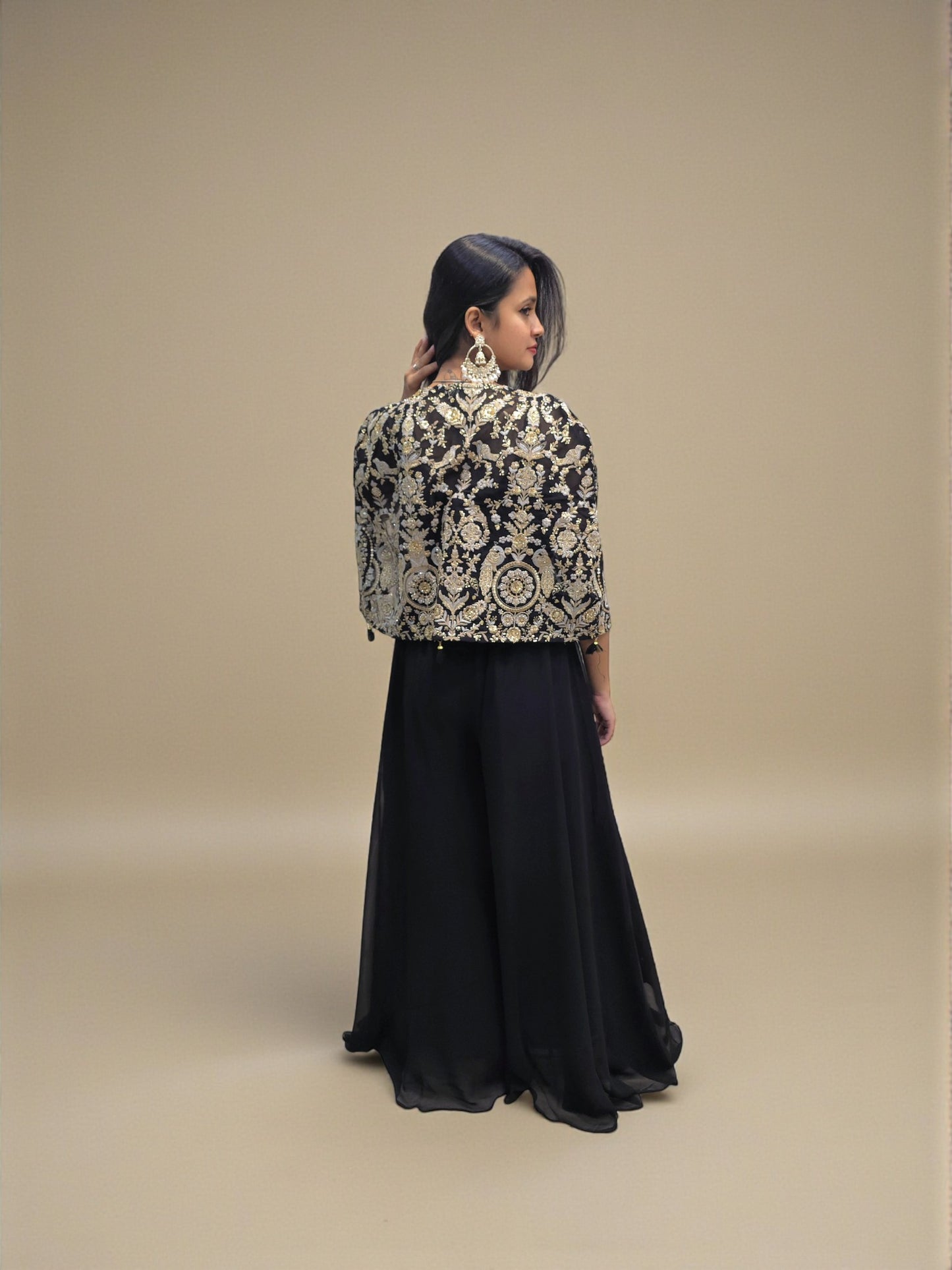 Elegant black crop top palazzo outfit for evening events