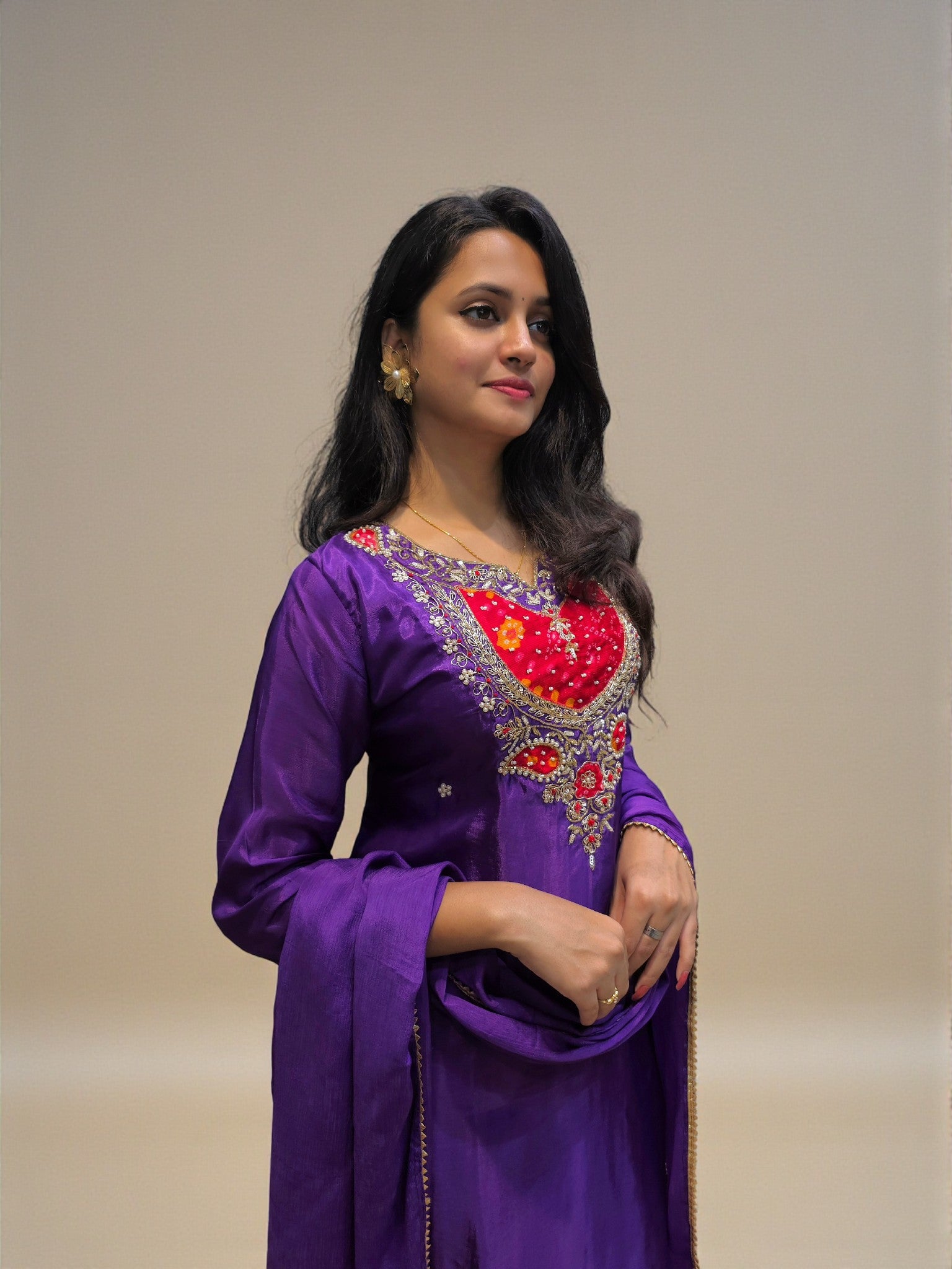 Elegant purple kurta palazzo set featuring detailed handwork