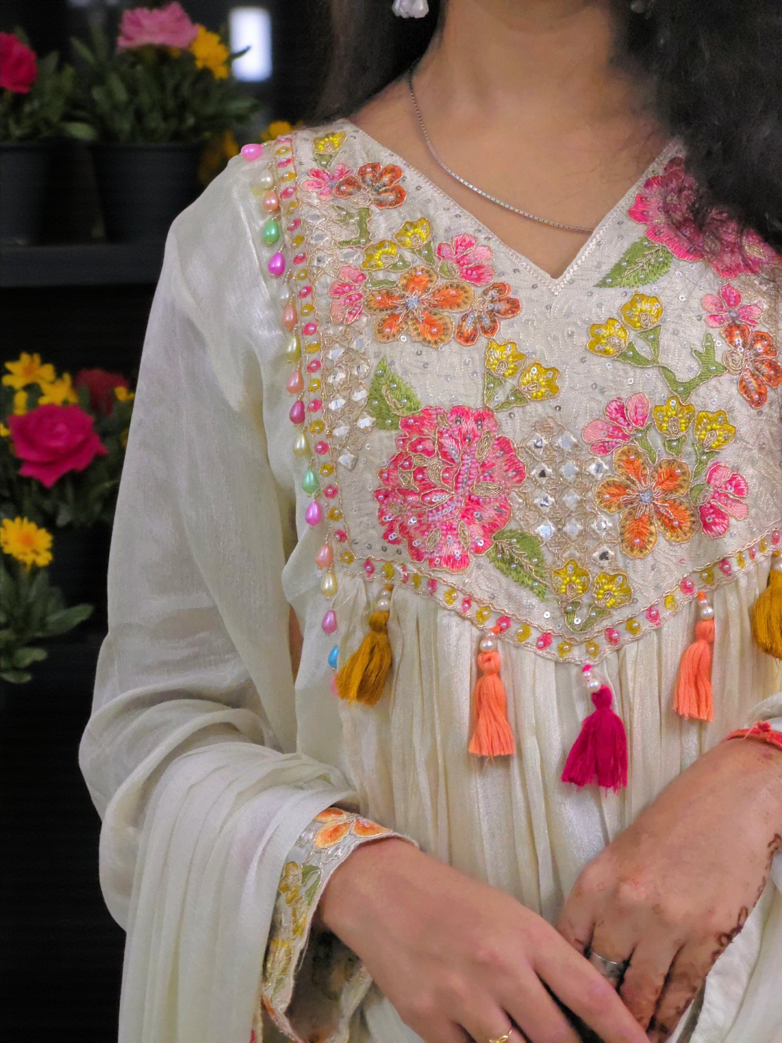 Off white festive kurta suit with delicate embroidery detailing