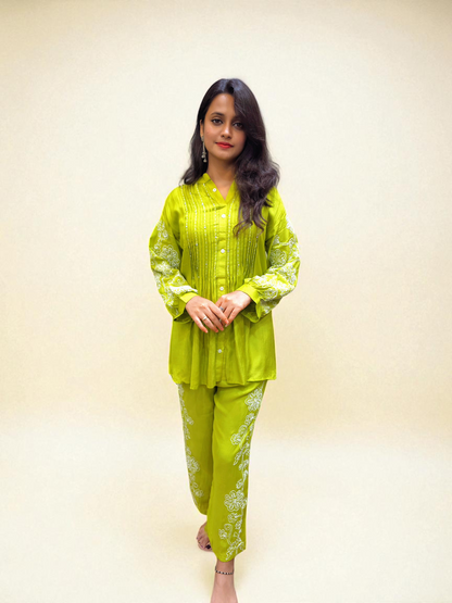 Elegant women’s muslin embroidered co-ord set in soft breathable fabric, perfect festive and casual wear outfit.