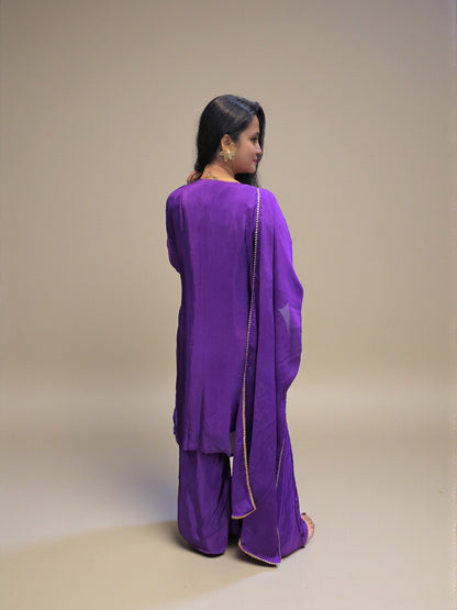back view of Ethnic purple hand embroidered kurta palazzo set for women