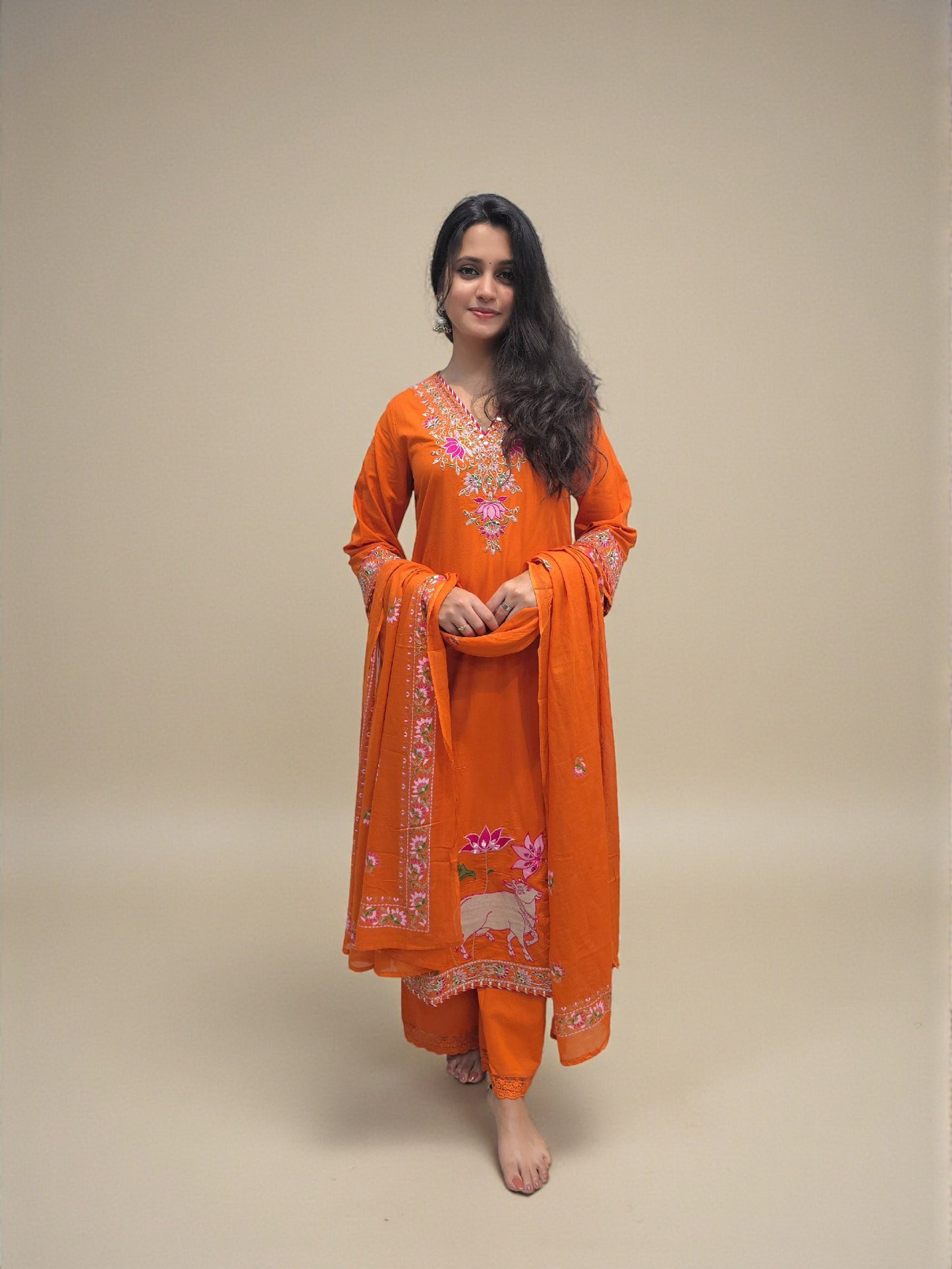 Fancy cotton kurta set for women in rust orange shade with embroidery