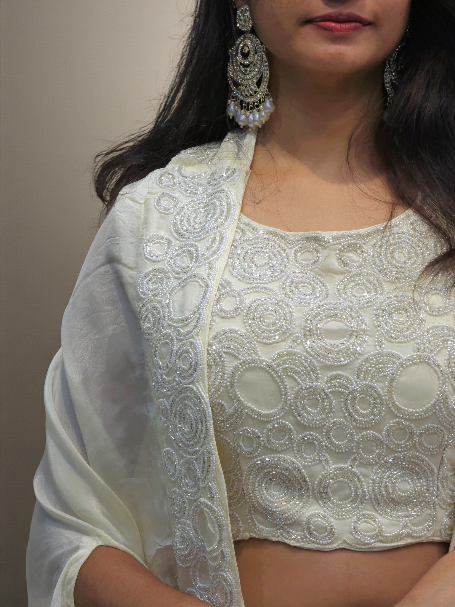 Festive indo-western ivory outfit with stylish cape and dhoti skirt