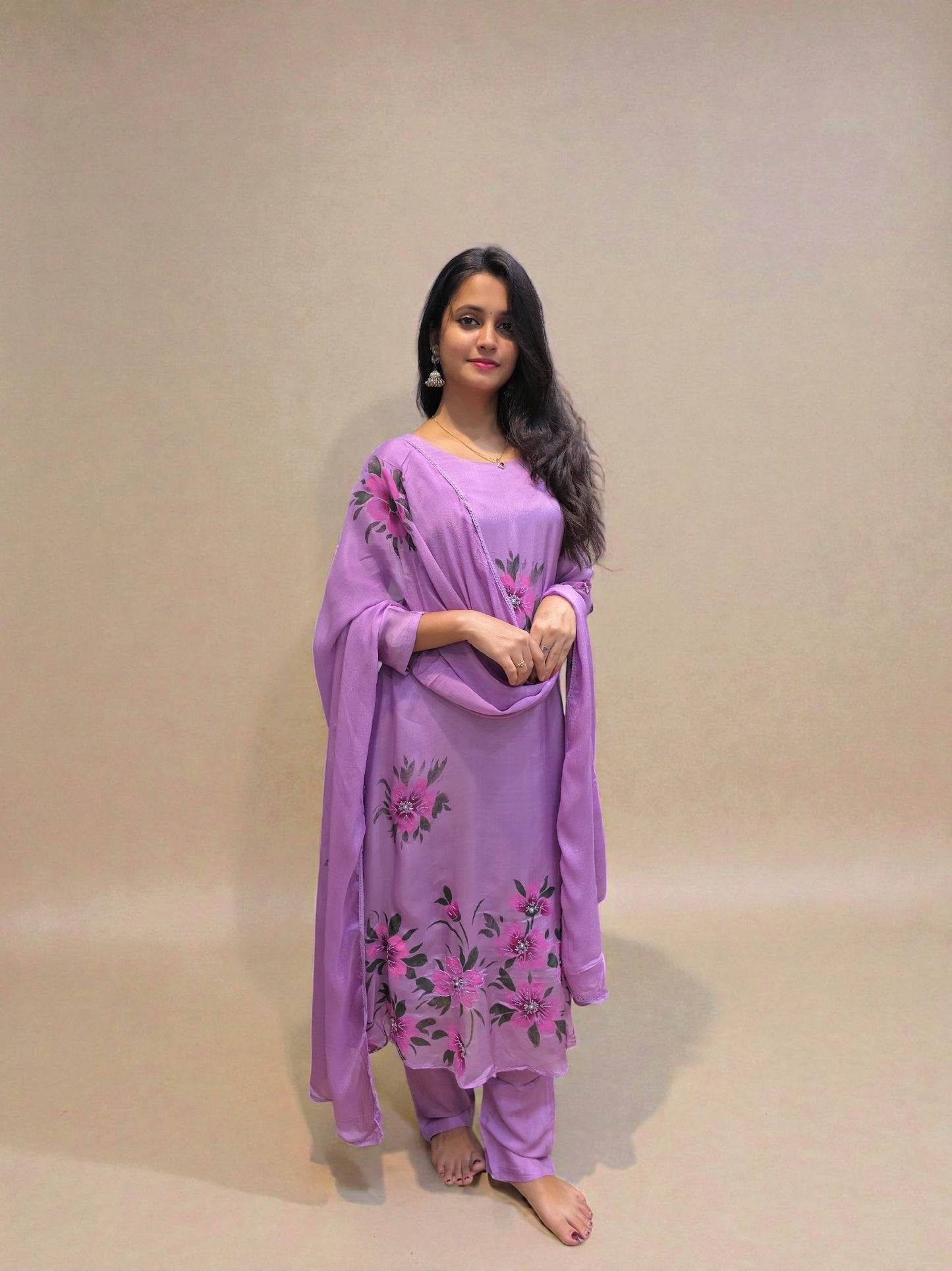 Floral handwork detailing on pure chinnon A-line kurta set front view