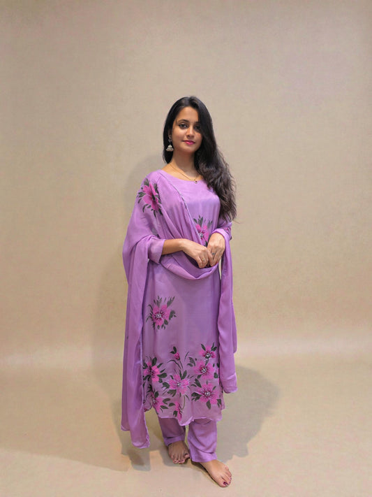 Floral handwork detailing on pure chinnon A-line kurta set front view