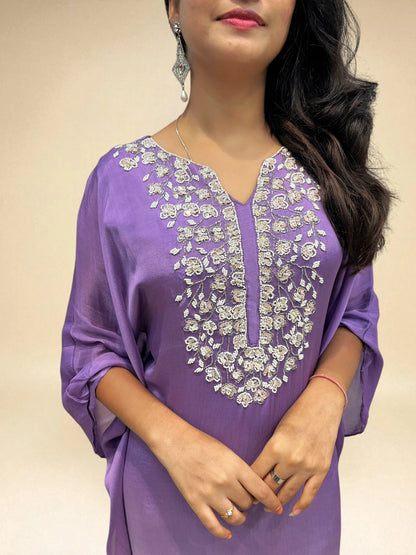 closeup view of purple white kaftan set with floral hand work from ambika boutique