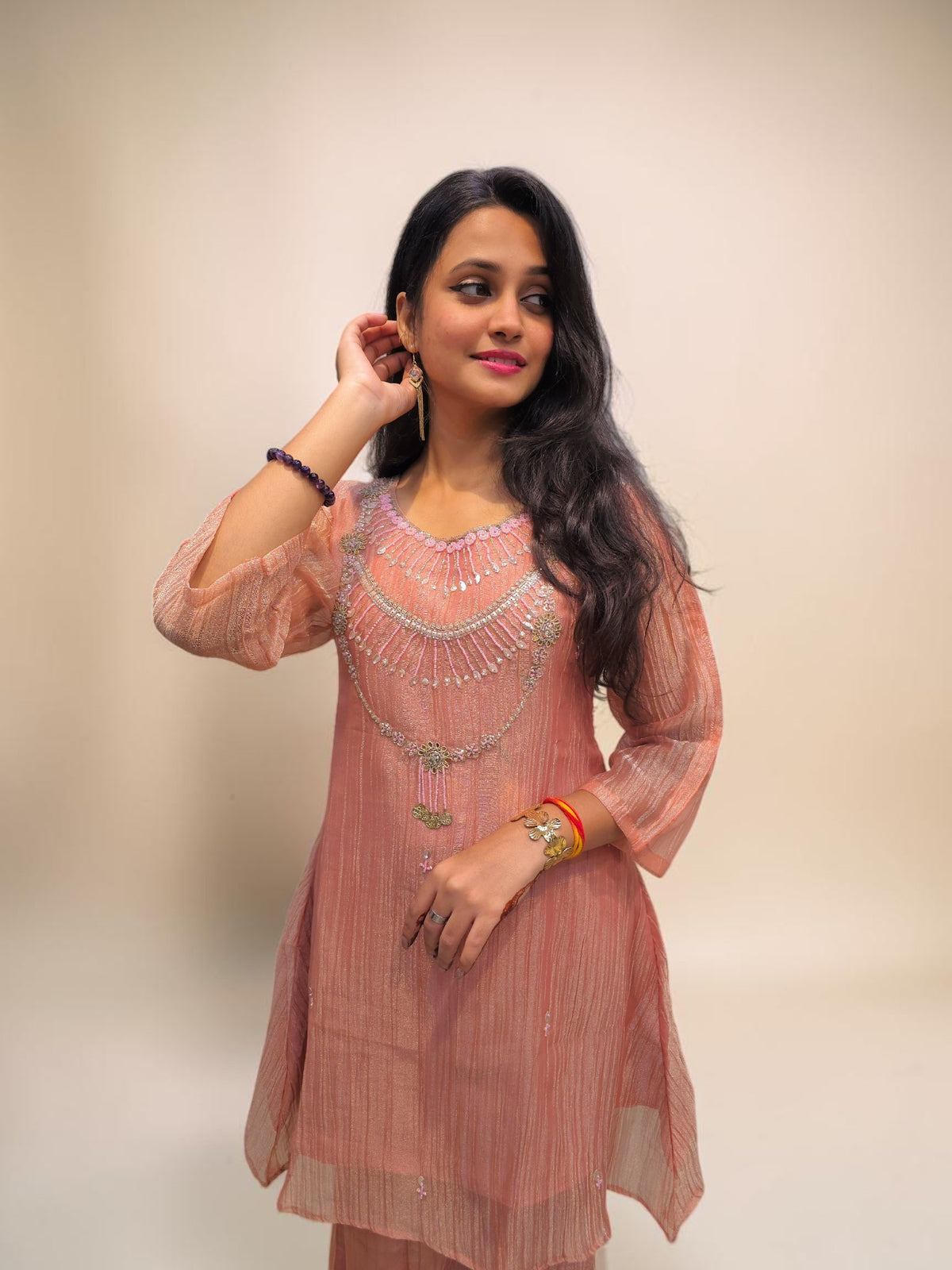 Elegant peach co ord outfit with intricate handwork embroidery