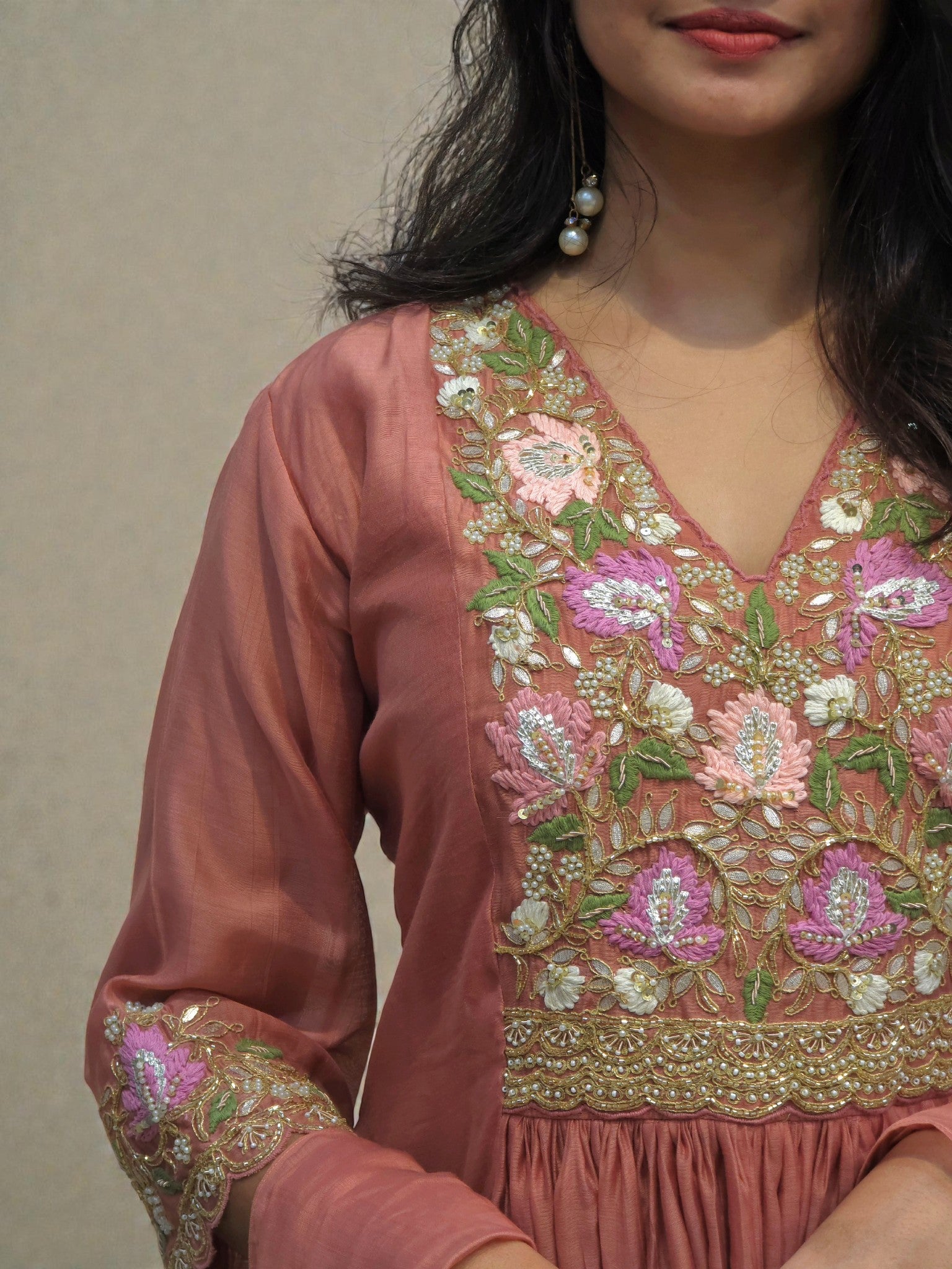 Peach embroidered kurta and pant set with handcrafted detailing