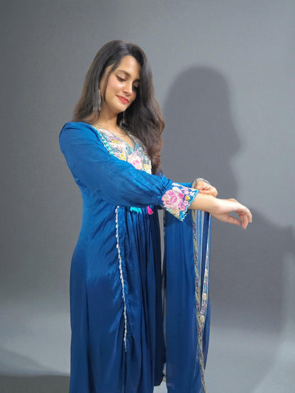 Traditional chinnon silk kurta set with detailed floral embroidery