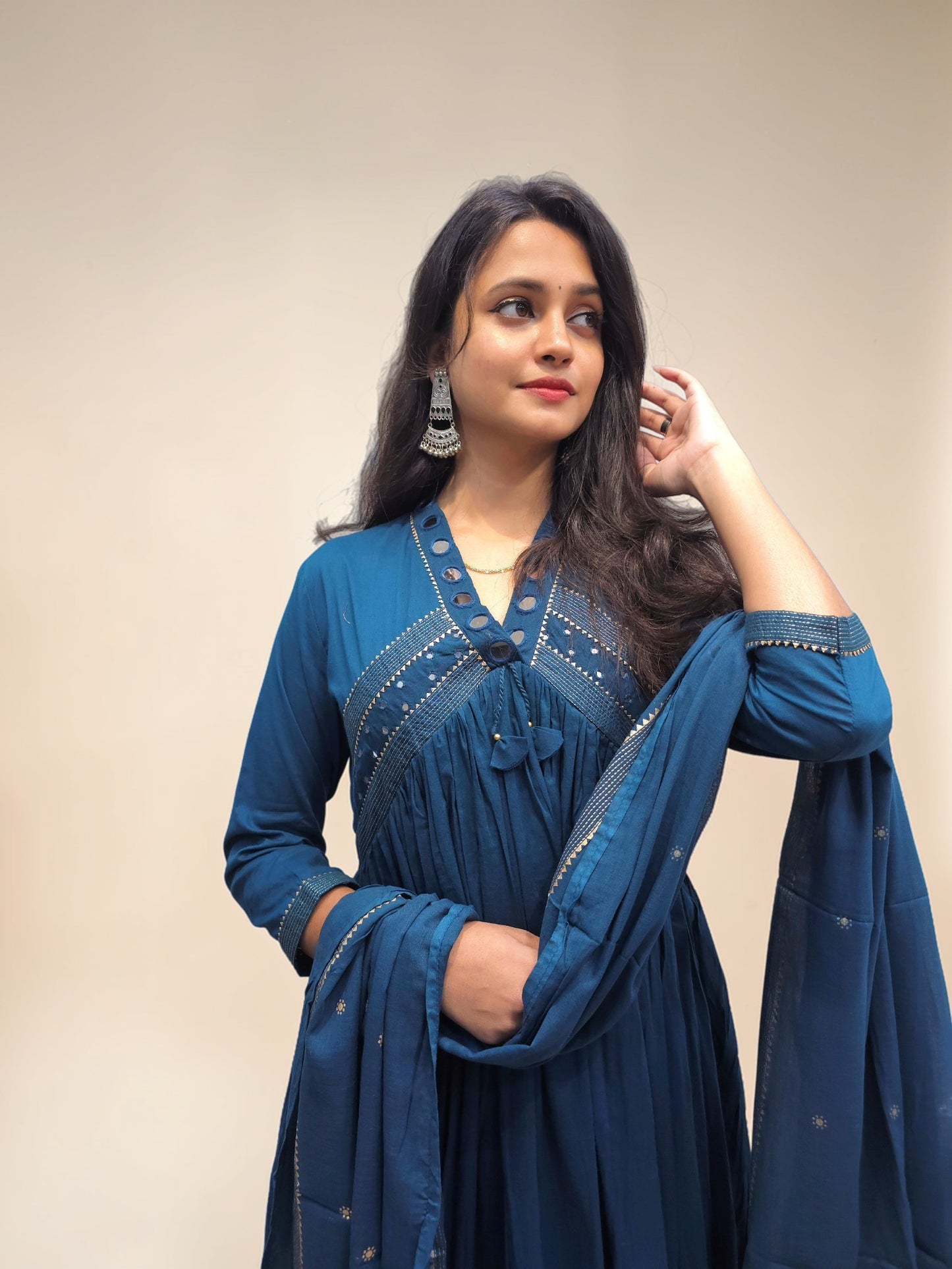 Traditional blue Anarkali kurta set with embroidery and dupatta