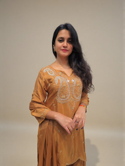 Zardozi handwork kurta palazzo in rust orange color