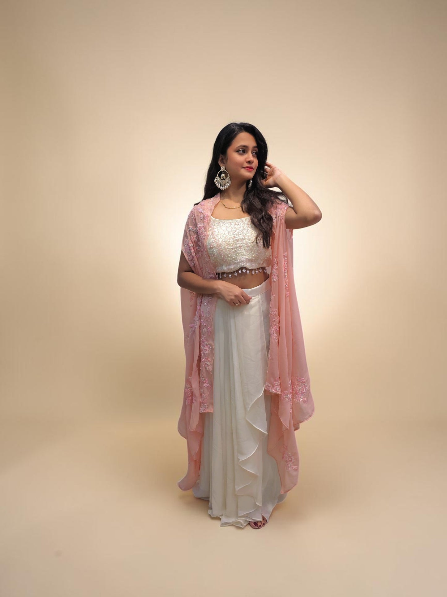 White crop top dhoti skirt with pink shrug indo western set