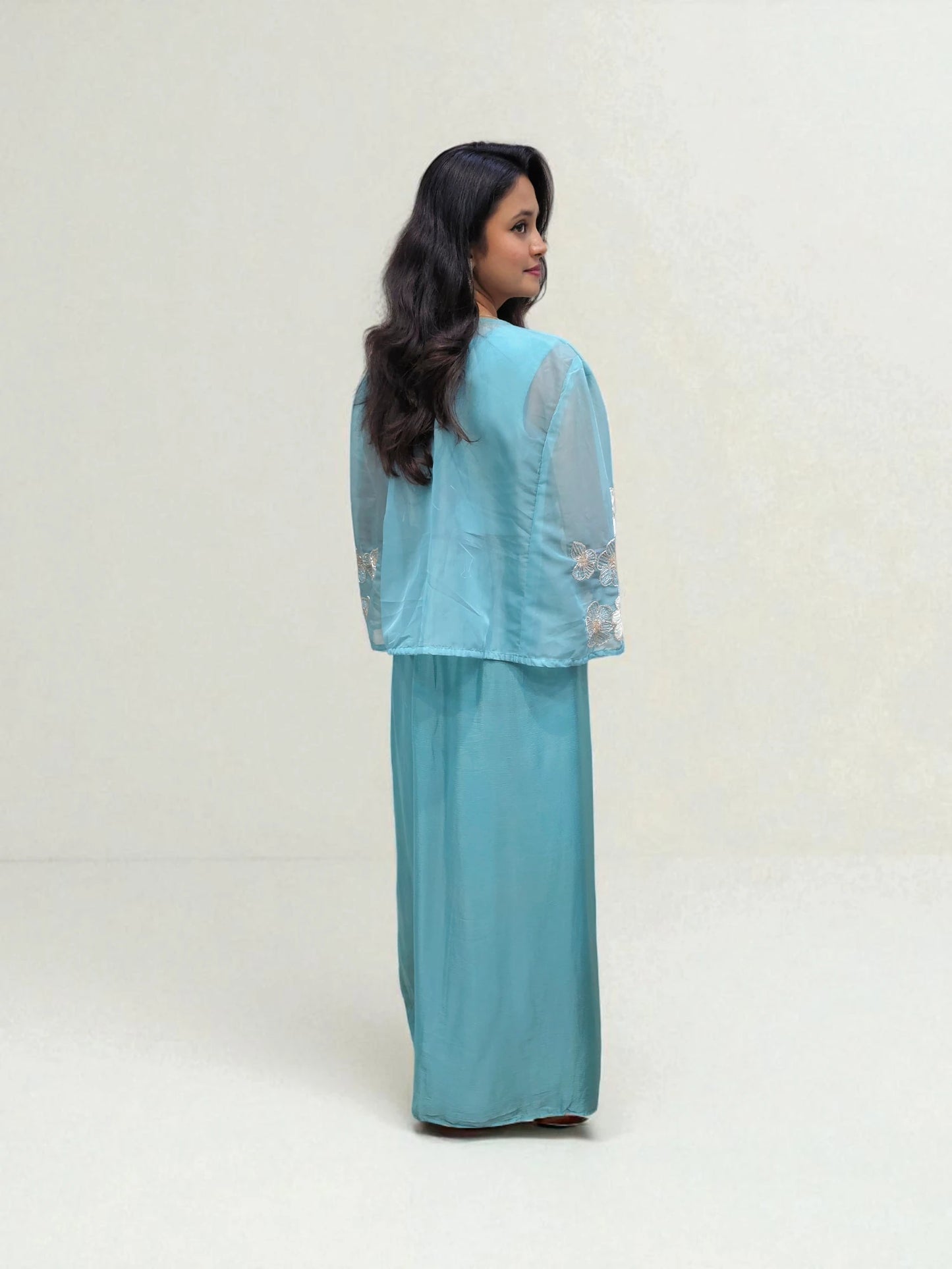 back view of Blue crop top with dhoti skirt and organza shrug featuring applique handwork – Ambika Boutique