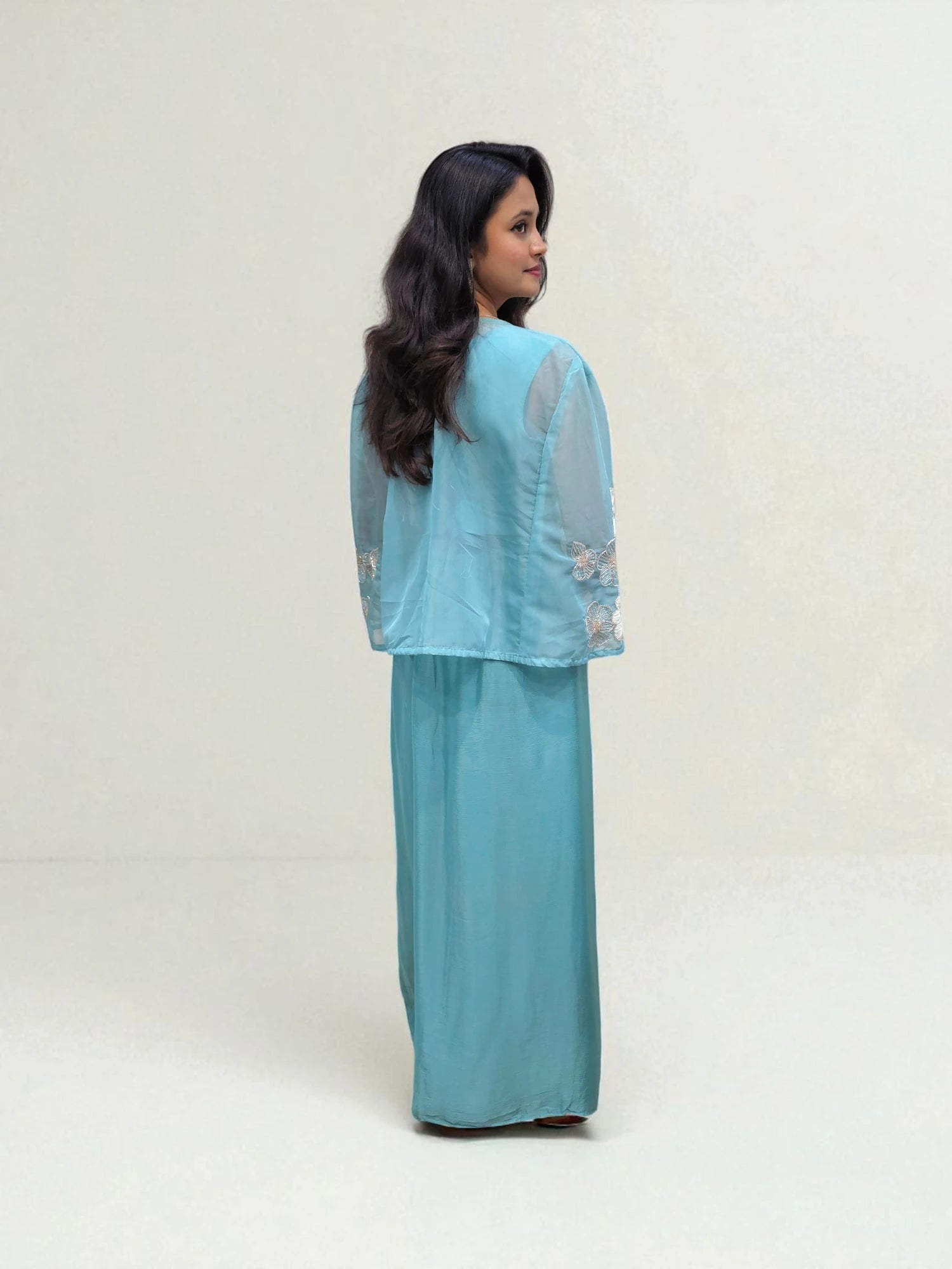 back view of Blue crop top with dhoti skirt and organza shrug featuring applique handwork – Ambika Boutique