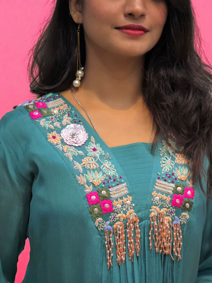 close up of Designer teal kurti set with colorful hand embroidery and palazzo– party wear Indo-Western look for women