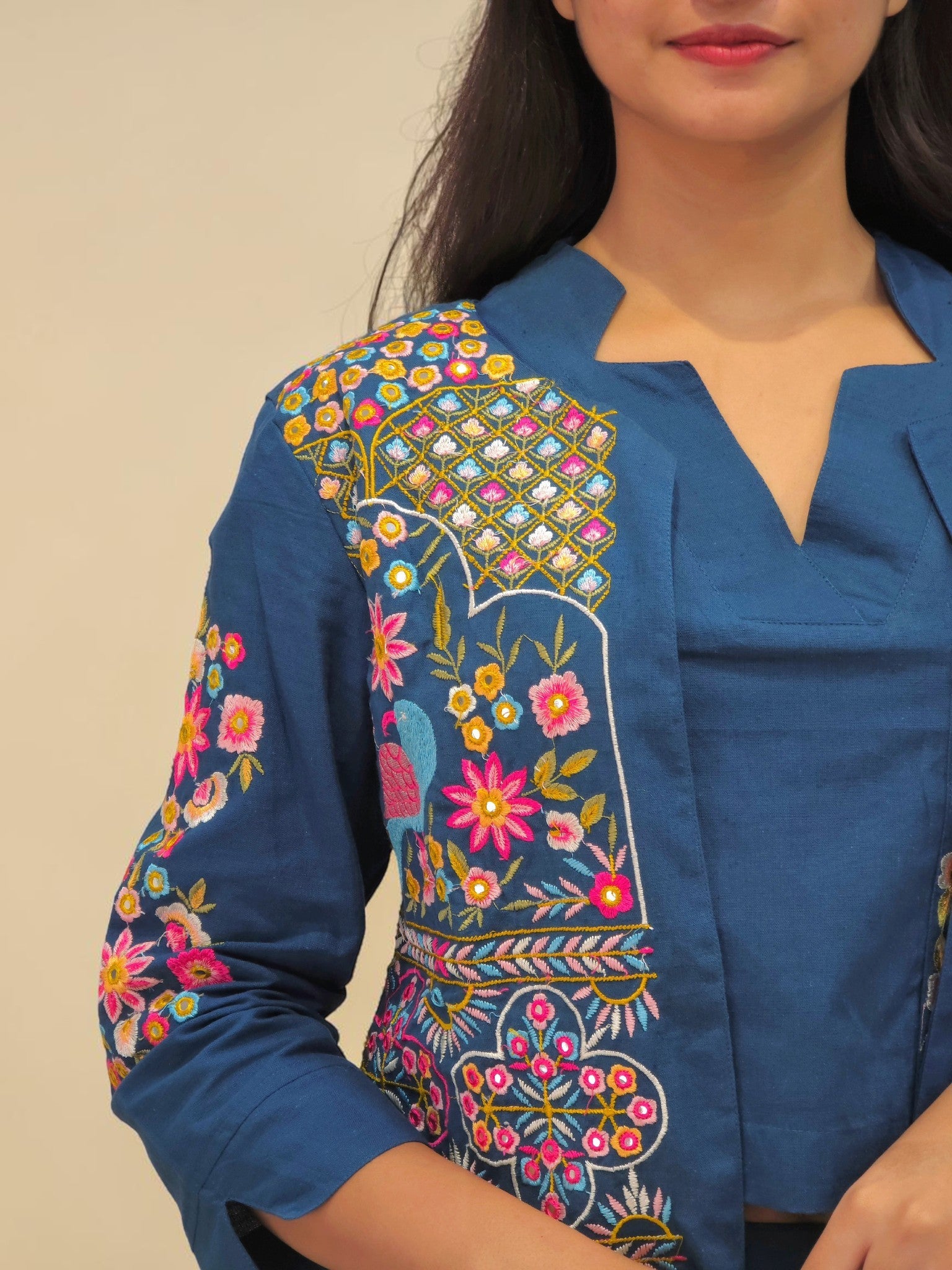 close up Women's embroidered jacket co-ord set with matching trousers