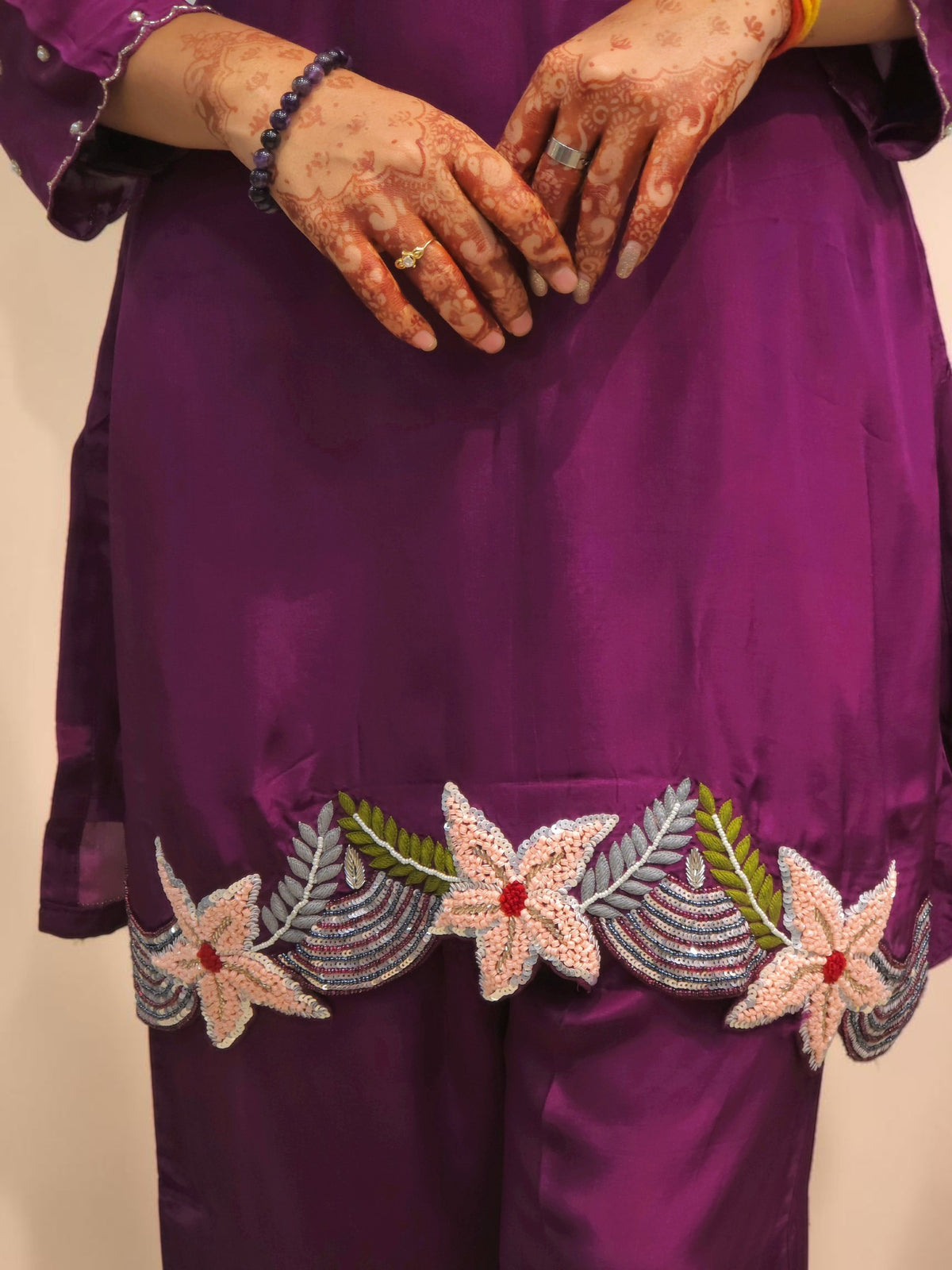 close up of Wine purple designer ethnic outfit with handcrafted detailing