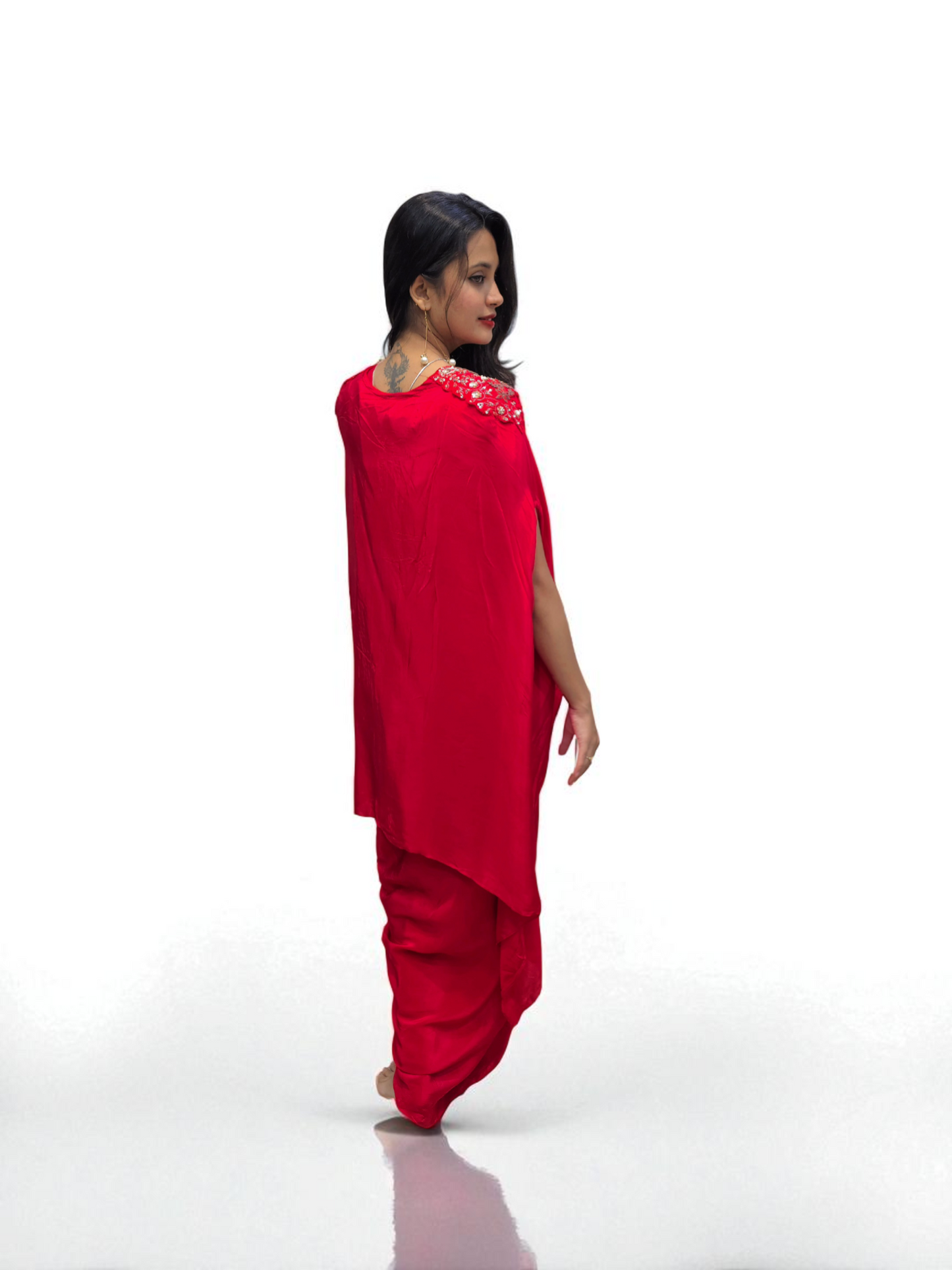 Woman wearing a Designer Black Cape Dhoti Skirt Set with Hand Embroidery by Ambika Boutique, ideal for festive occasions.