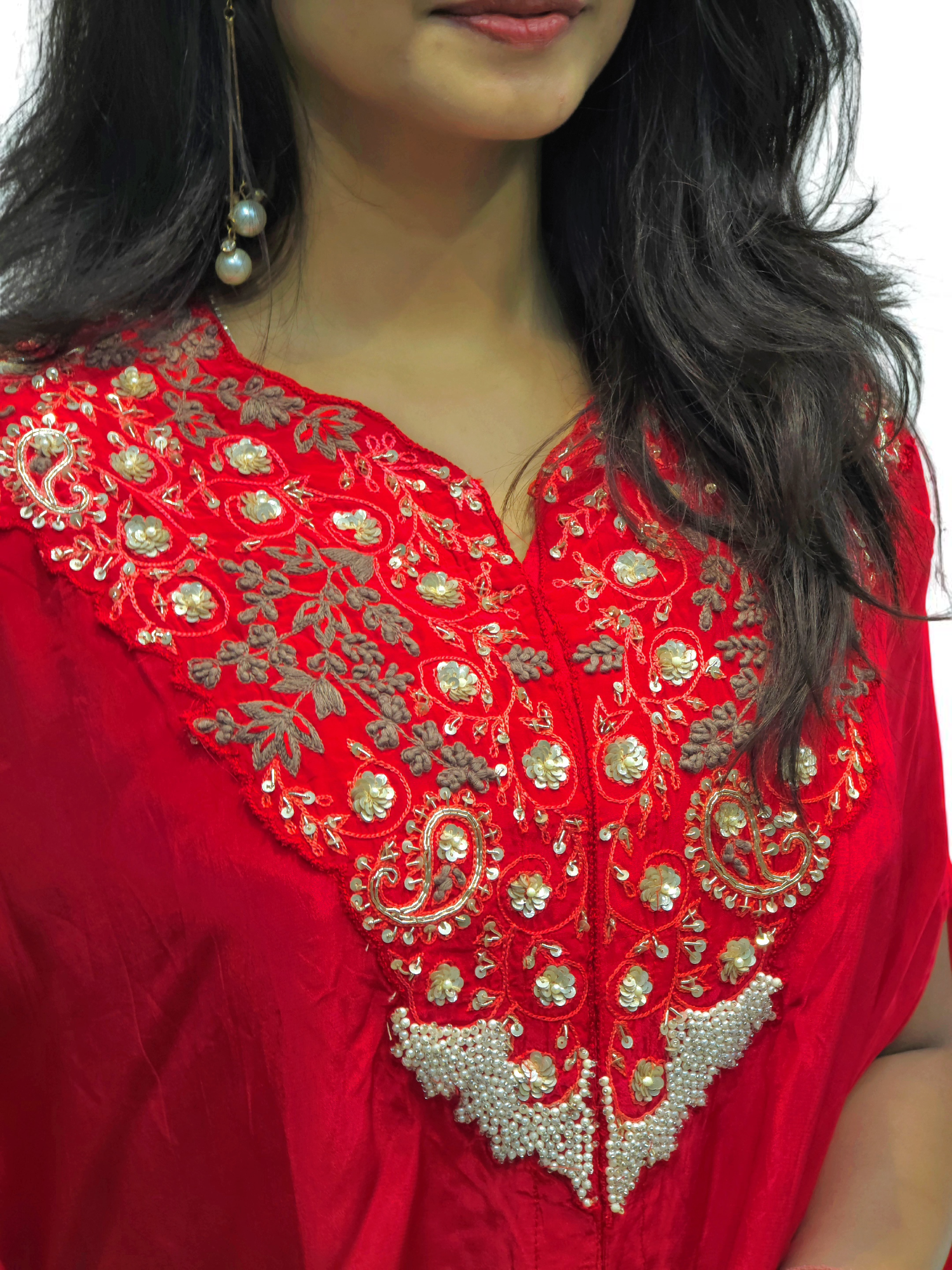 Woman wearing a Designer Black Cape with intricate hand embroidery, showcasing elegance and style for festive occasions.