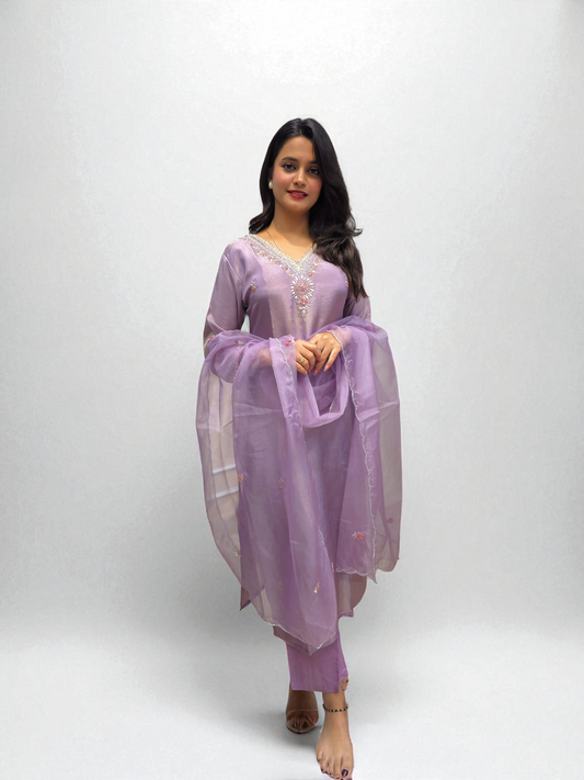 Model wearing a lavender Pure Shimmer Tissue Kurta Set with elegant handwork, paired with a matching organza dupatta.